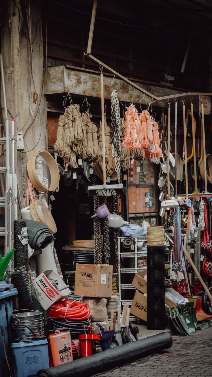 Crafting Captivating Headlines: Your awesome post title goes here Rustic workshop filled with various tools, materials, and industrial supplies.